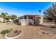Well-maintained single-story home featuring a covered porch, landscaped yard, and a welcoming exterior at 2650 W Union Hills Dr # 51, Phoenix, AZ 85027