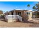 Charming single story home featuring a covered front porch and landscaped front yard at 2650 W Union Hills Dr # 51, Phoenix, AZ 85027
