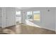 Bright living room featuring wood-look flooring and ample natural light at 2650 W Union Hills Dr # 51, Phoenix, AZ 85027