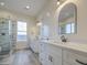 Bathroom features a glass shower, dual sink vanity, and lots of bright light at 28003 N Faded Creek Dr, Florence, AZ 85132