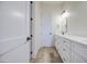 Modern bathroom featuring a double sink vanity with white cabinets and a beautiful countertop at 28003 N Faded Creek Dr, Florence, AZ 85132