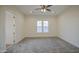 Bedroom with carpet flooring and double windows providing lots of bright light at 28003 N Faded Creek Dr, Florence, AZ 85132