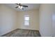 This bedroom is bright and inviting with neutral decor and a window for natural light at 28003 N Faded Creek Dr, Florence, AZ 85132