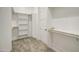Walk-in closet with carpet flooring and plenty of shelving at 28003 N Faded Creek Dr, Florence, AZ 85132