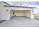 Spacious and clean garage interior featuring ample space for parking and storage at 28003 N Faded Creek Dr, Florence, AZ 85132