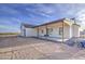 Covered patio provides outdoor dining and relaxation space with pleasant views of the property at 28003 N Faded Creek Dr, Florence, AZ 85132