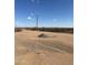 A desert road with a pile of rocks at 28003 N Faded Creek Dr, Florence, AZ 85132