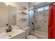 Cozy bathroom with tiled shower, floating shelves and modern vanity at 3015 E Dahlia Dr, Phoenix, AZ 85032