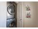 Laundry room with stacked washer and dryer at 3015 E Dahlia Dr, Phoenix, AZ 85032
