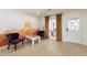 Bright living area featuring unique mural, modern furniture, and natural light at 3015 E Dahlia Dr, Phoenix, AZ 85032