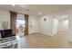 Spacious living room area with views to the porch, and easy access to other rooms at 3015 E Dahlia Dr, Phoenix, AZ 85032