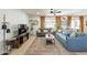 Comfortable living room with stylish furniture, area rug, and bright window views at 3015 E Dahlia Dr, Phoenix, AZ 85032