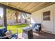 Cozy covered patio with comfortable seating, perfect for relaxation and enjoying the outdoor scenery at 3015 E Dahlia Dr, Phoenix, AZ 85032
