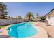 Backyard view of the refreshing pool and patio, great for relaxing at 3015 E Dahlia Dr, Phoenix, AZ 85032