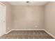 Cozy bedroom features neutral paint, ceiling fan, and plush carpet flooring at 40049 W Hopper Dr, Maricopa, AZ 85138