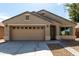 Charming single-Gathering home featuring a two-car garage, neutral stucco, and a well-maintained landscape at 40049 W Hopper Dr, Maricopa, AZ 85138