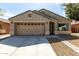 Charming single-Gathering home featuring a two-car garage, neutral stucco, and a well-maintained landscape at 40049 W Hopper Dr, Maricopa, AZ 85138