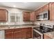 Well-appointed kitchen with ample countertop space and stainless steel appliances at 40049 W Hopper Dr, Maricopa, AZ 85138