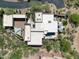 Bird's eye view of a home with a pool, patio seating, and surrounding desert landscape at 40478 N 108Th Pl, Scottsdale, AZ 85262