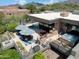 Stunning backyard featuring a pool, spa, patio with seating, mature landscaping, and desert views at 40478 N 108Th Pl, Scottsdale, AZ 85262