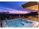 Relaxing hot tub area with serene desert views at twilight at 40478 N 108Th Pl, Scottsdale, AZ 85262