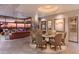 Open-concept living room with stone accent wall, modern furniture, and stunning desert views at 40478 N 108Th Pl, Scottsdale, AZ 85262