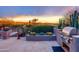 Outdoor kitchen features a built-in grill and desert landscaping at 40478 N 108Th Pl, Scottsdale, AZ 85262