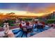 Beautiful outdoor patio with dining sets, desert views, and landscaping at 40478 N 108Th Pl, Scottsdale, AZ 85262