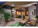 Cozy outdoor seating area with lush greenery and desert ambiance at 40478 N 108Th Pl, Scottsdale, AZ 85262