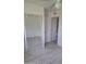 A spacious and bright bedroom with wood-look floors and closet with mirrored doors at 4304 N Parkway Ave, Scottsdale, AZ 85251