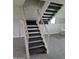Carpeted staircase with white railing leading to the upper level at 4304 N Parkway Ave, Scottsdale, AZ 85251