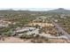 Aerial view of home showing location near desert and city at 49011 N 7Th Ave, New River, AZ 85087