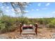 Backyard deck and sitting area in a secluded outdoor setting at 49011 N 7Th Ave, New River, AZ 85087