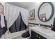 Stylish bathroom features modern fixtures, elegant decor, and a shower-tub combination at 49011 N 7Th Ave, New River, AZ 85087