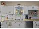 Detailed view of kitchen area, featuring granite counters, and stainless steel appliances at 49011 N 7Th Ave, New River, AZ 85087