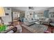 Comfortable living room featuring plush seating and stylish decor with natural lighting at 49011 N 7Th Ave, New River, AZ 85087