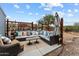 Comfortable patio area with ample seating, perfect for relaxing outdoors and enjoying the view at 49011 N 7Th Ave, New River, AZ 85087