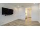 Large bedroom with tiled flooring and access to a bright Primary bathroom at 5650 E Scarlet St, Mesa, AZ 85215
