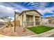 Gorgeous home with a welcoming front porch and desert landscaping, situated on a corner lot at 5650 E Scarlet St, Mesa, AZ 85215