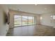 The living room features a large sliding glass door leading to the backyard at 5650 E Scarlet St, Mesa, AZ 85215