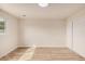 Spacious, bright bedroom with new floors, a window, and closet doors, featuring neutral walls at 6265 W Mariposa St, Phoenix, AZ 85033