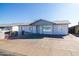 Charming single-story home with a well-maintained front yard and a concrete driveway on a sunny day at 7217 W Claremont St, Glendale, AZ 85303