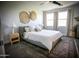 Bright and airy main bedroom with a comfortable bed, ample natural light, and tasteful decor for a relaxing retreat at 7531 E Billings St # 132, Mesa, AZ 85207