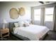 Elegantly styled main bedroom with a comfortable bed, decorative accents, and bright ambiance, creating a serene atmosphere at 7531 E Billings St # 132, Mesa, AZ 85207