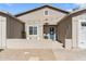 Charming front entryway with cozy seating, a blue front door, and stylish overhead string lights at 804 E Palmaire Ave, Phoenix, AZ 85020