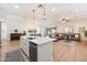 Open concept living area, seamlessly combining the kitchen, dining, and Gathering room at 804 E Palmaire Ave, Phoenix, AZ 85020