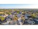 Expansive aerial view of a beautiful suburban neighborhood with well-maintained homes and desert landscaping at 8219 E Tesoro Cir, Mesa, AZ 85207