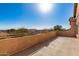Expansive balcony with stunning panoramic views of the surrounding landscape and distant mountain ranges at 8219 E Tesoro Cir, Mesa, AZ 85207