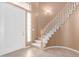 Entry with staircase and neutral walls at 8219 E Tesoro Cir, Mesa, AZ 85207
