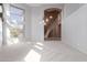 Spacious living room with staircase access at 8219 E Tesoro Cir, Mesa, AZ 85207